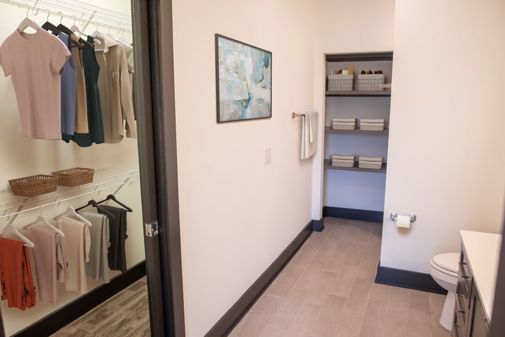 Model bathroom with walk-in closet at Belcourt Park in Nashville, Tennessee