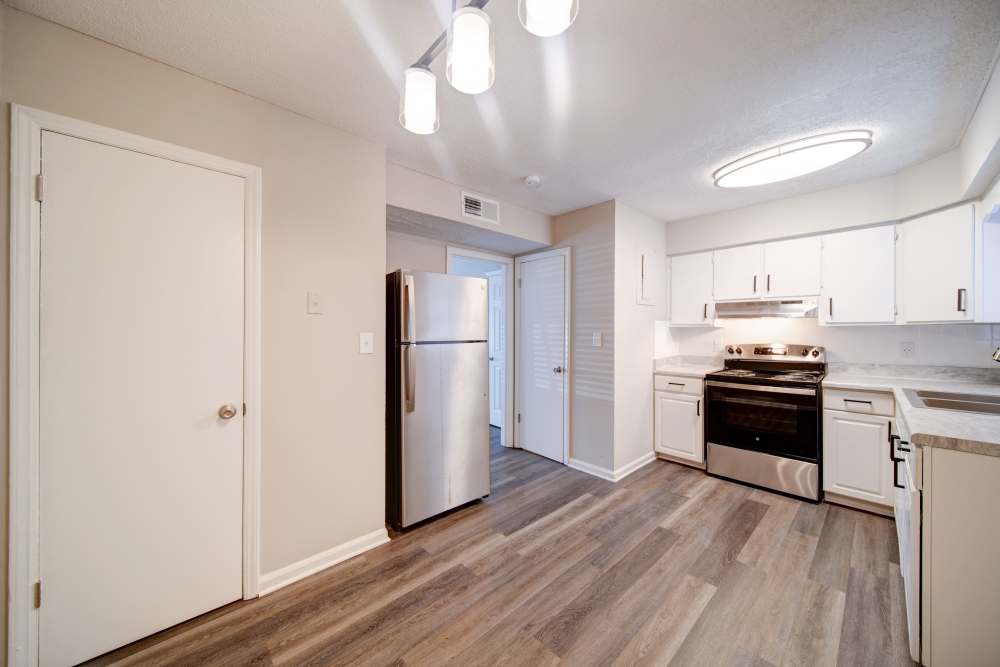 Apartment home kitchen at The Manor Townhomes in Winston-Salem, North Carolina