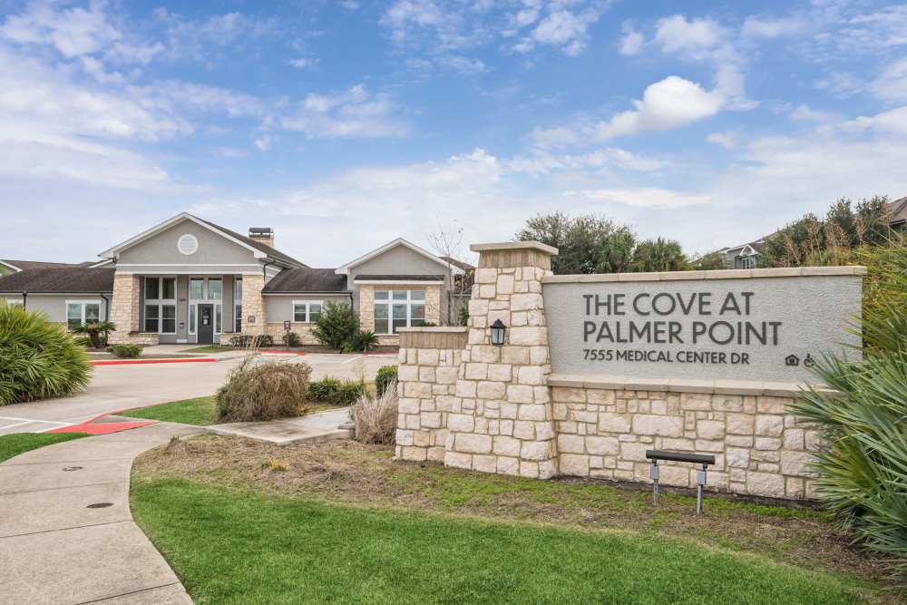 Apartment sign board at The Cove at Palmer Point in Texas City, Texas