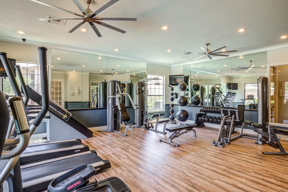 Well-equipped fitness center at Park Hudson Place in Bryan, Texas