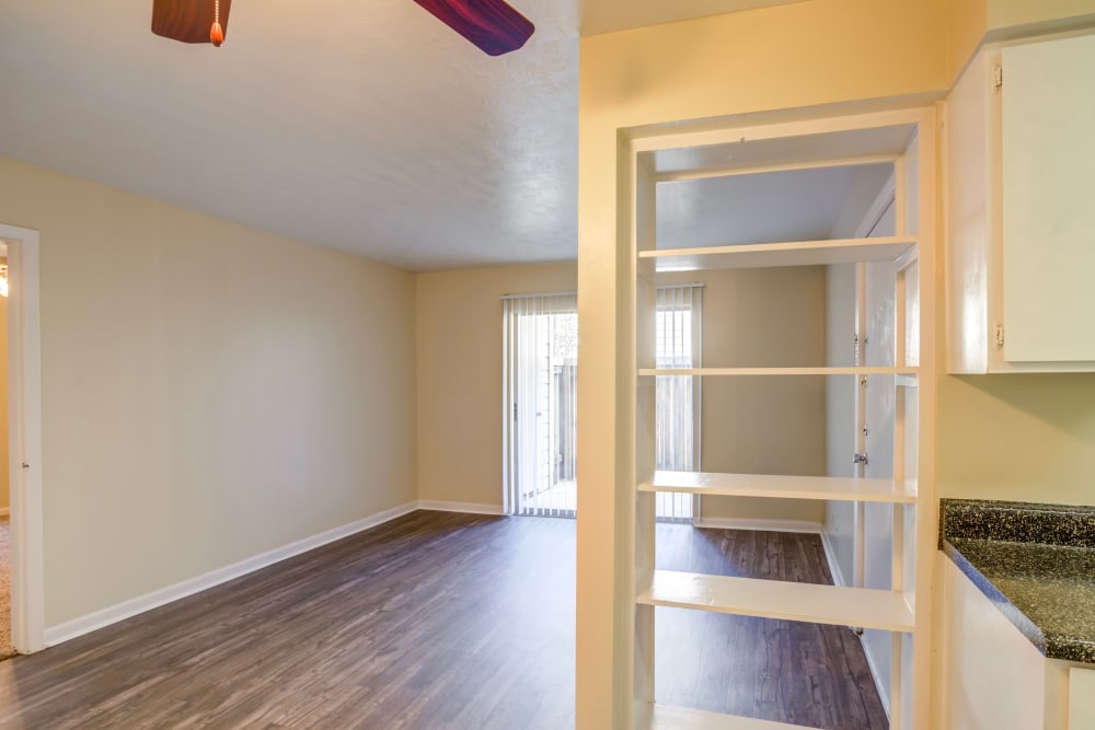 Move-in ready apartment with built in shelving and patio access at Riverstone Apartments in Bryan, Texas