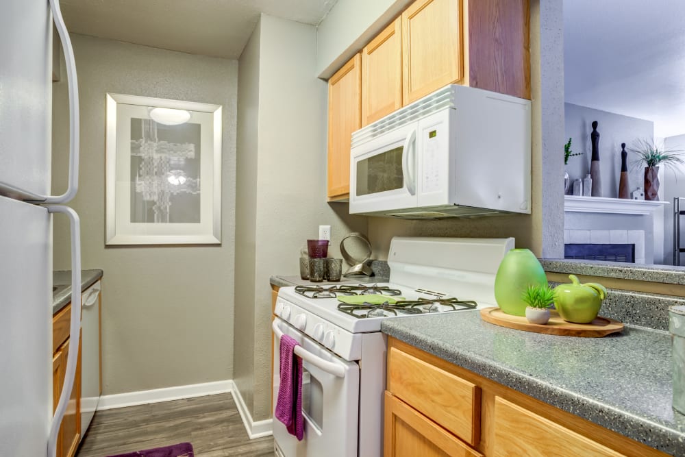 Fully equipped model kitchen at EnVue Apartments in Bryan, Texas