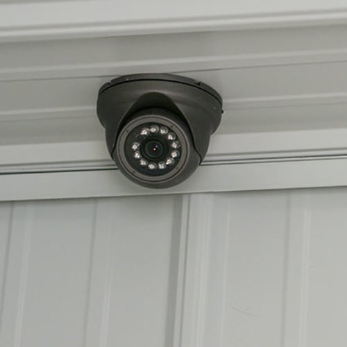 Indoor security camera mounted on the ceiling at Red Dot Storage in Pine Bluff, Arkansas