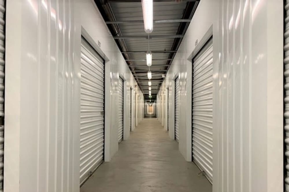 Interior units with white doors at Trojan Storage of Salinas Blanco in Salinas, California