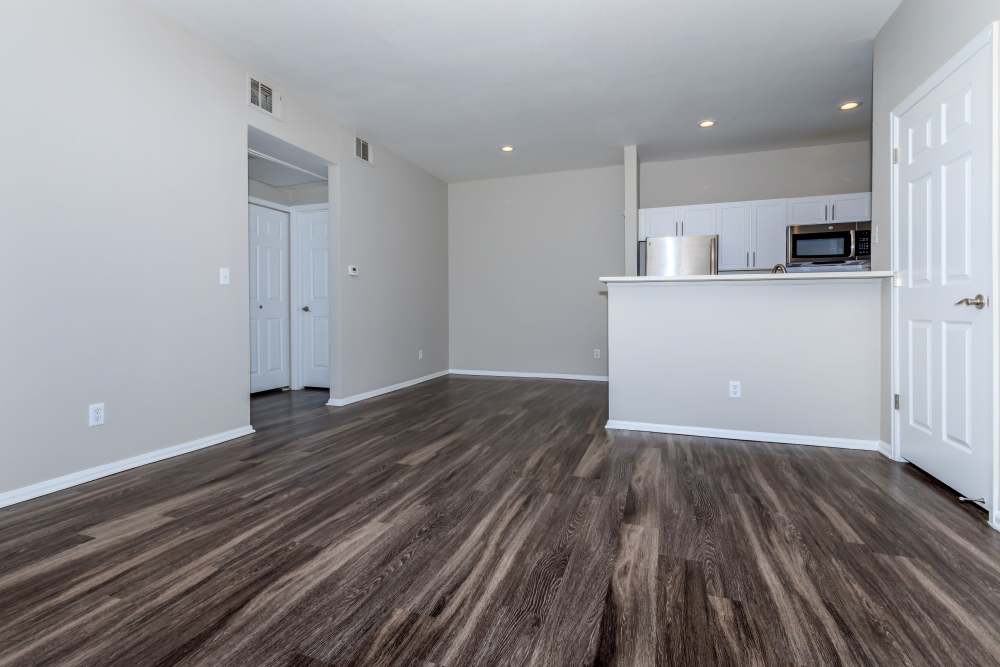 Open-concept of kitchen and living room at The Dakota at Governor's Ranch in Littleton,Colorado