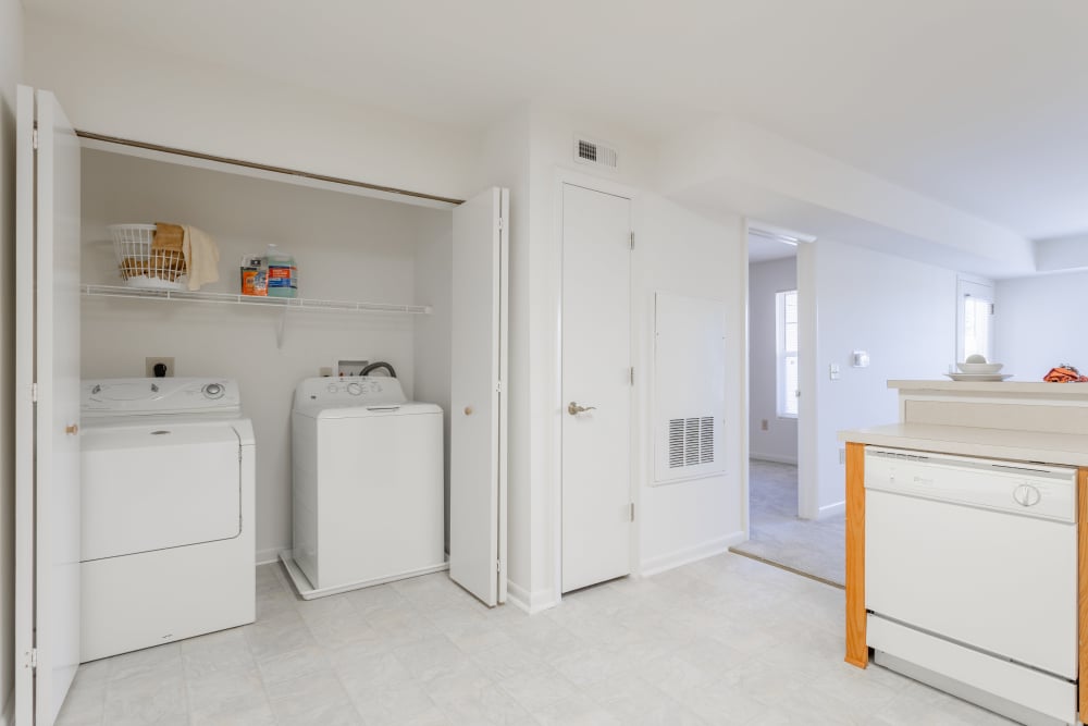 In-home washer and dryer at Corrigan Square Apartments in Gaithersburg, Maryland