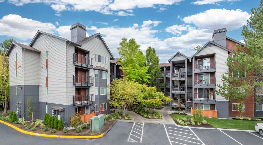 Apartment neighborhood with landscaped surroundings at Redmond Place Apartments in Redmond, Washington