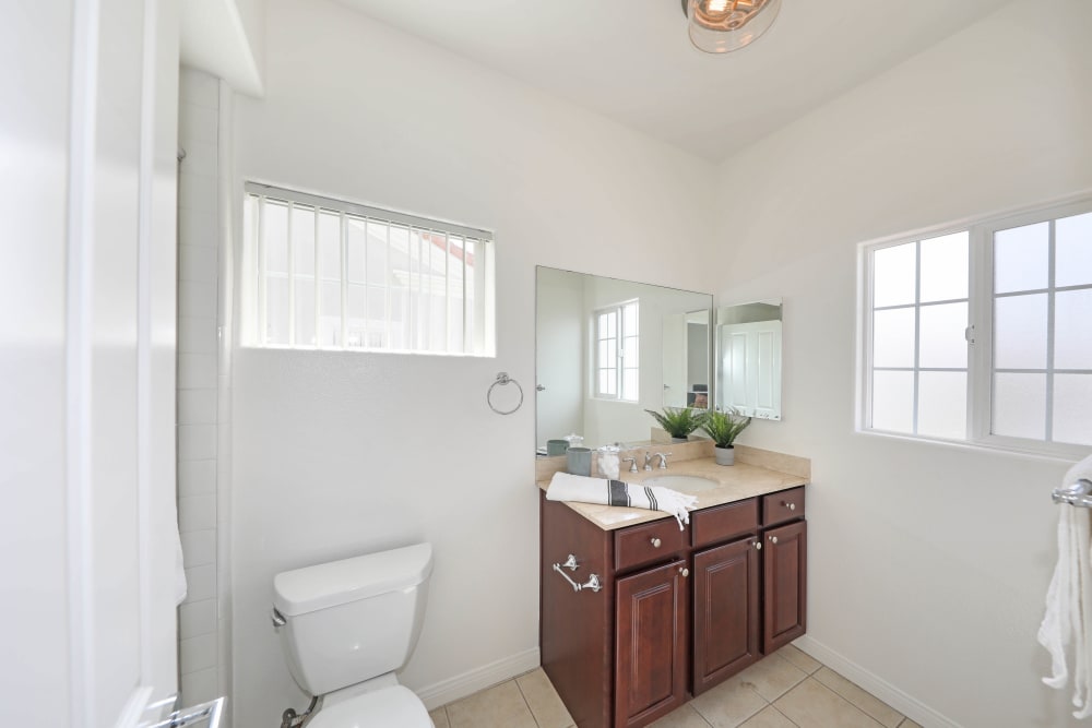 Modern finishes in a home's bathroom at Pacific Breeze Townhomes in Huntington Beach, California  