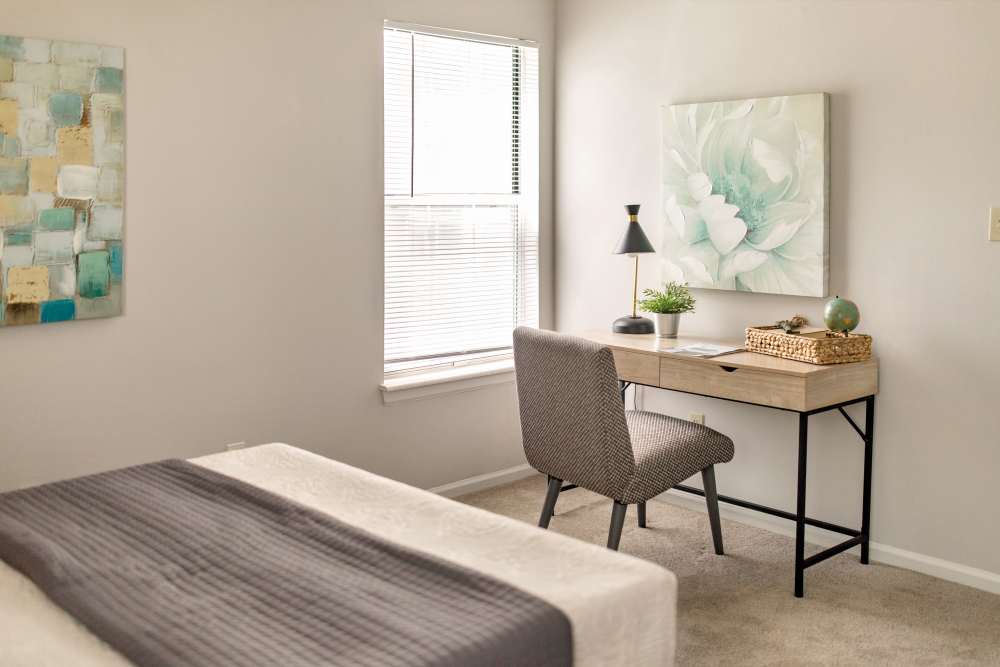 Bedroom with study table at Bonhomme Village in Olivette. MO