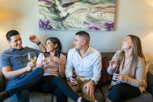 Residents hosting a small gathering in their new home Waterside at Ocotillo in Chandler, Arizona