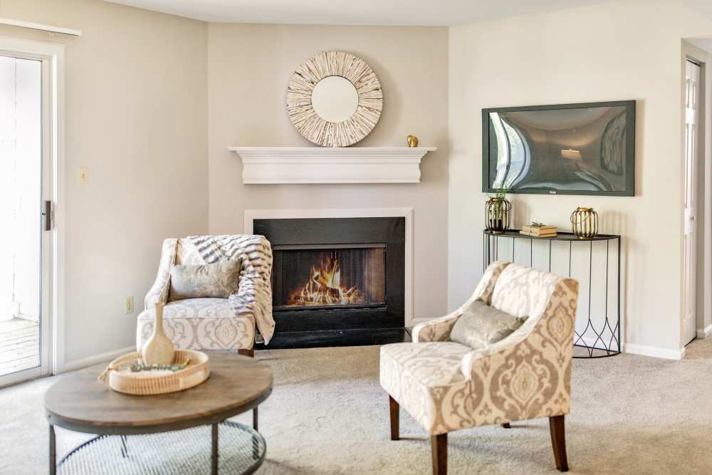 Living room with fire place at Bonhomme Village in Olivette. MO