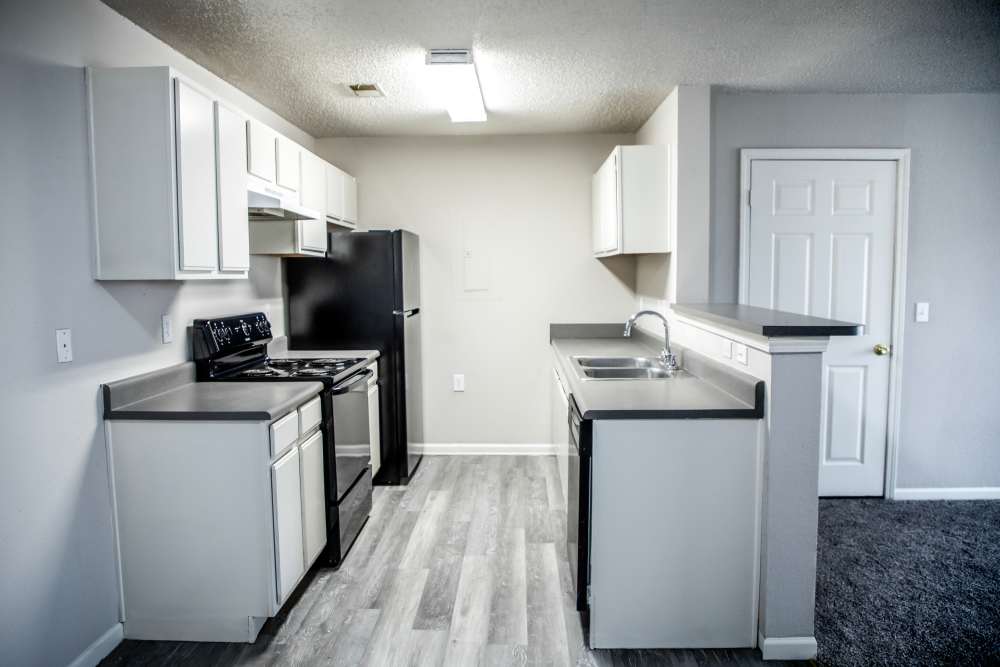 Kitchen at Whispering Plains Apartments in Guymon, Oklahoma