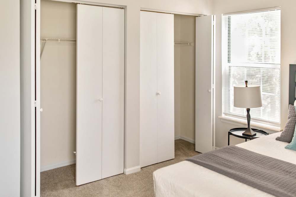 Bedroom with closets at Bonhomme Village in Olivette. MO
