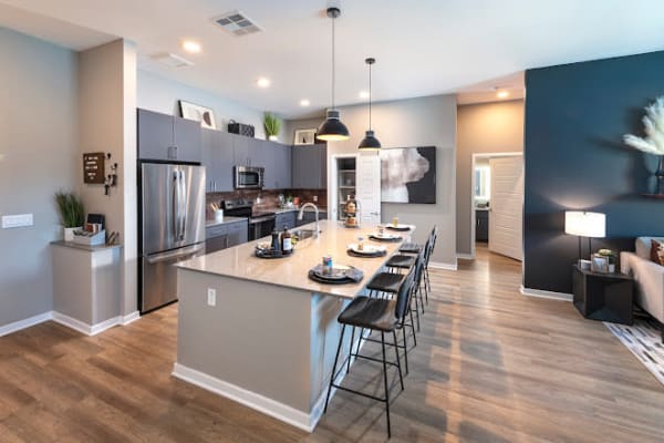 Couple cooking in their gourmet kitchen at Brix Warehouse District in Phoenix, AZ 