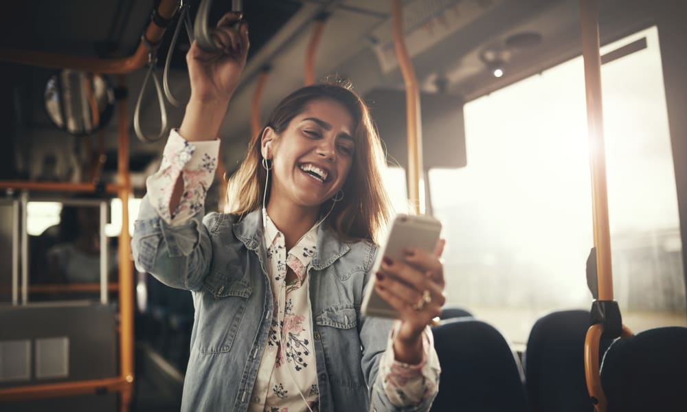 Resident student riding the bus to school from a transit stop very close to Domus on the Boulevard in Mountain View, California