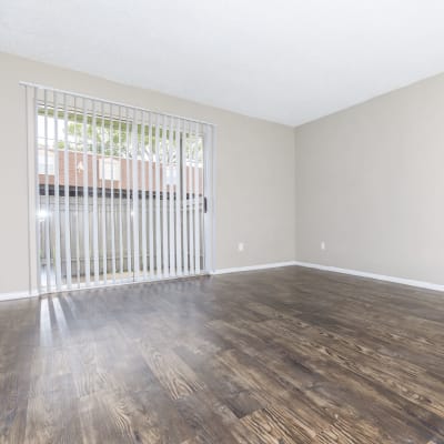 Home with plank flooring at CrescentWood Apartments in Clute, Texas