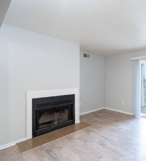 A fireplace in the living room at Twyckenham Apartments in Lafayette, Indiana
