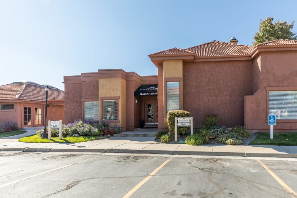 The clubhouse exterior at Shadowbrook Apartments in West Valley City, Utah