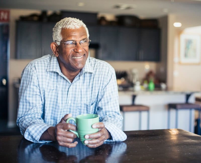 A man drinking coffee at The Sanctuary at Brooklyn Center in Brooklyn Center, Minnesota