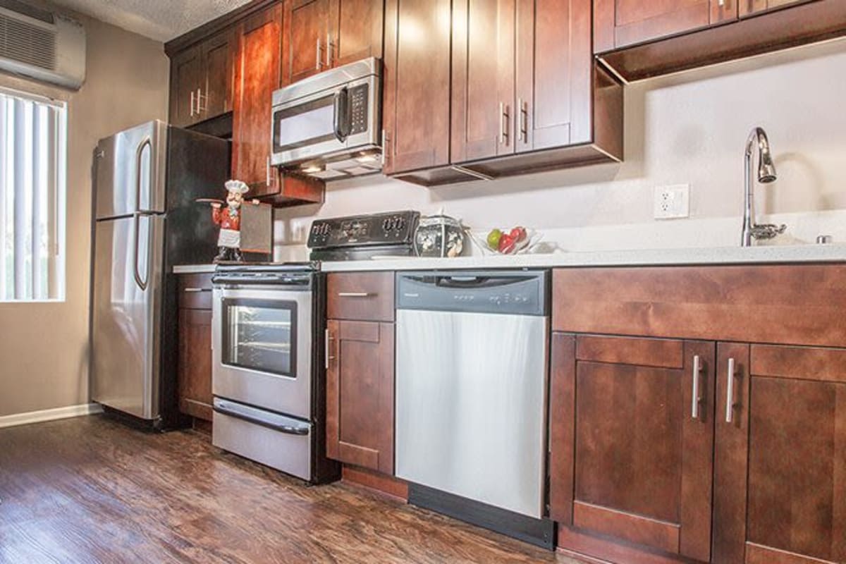 Kitchen with stainless-steel appliances at Ascent, West Hollywood, California