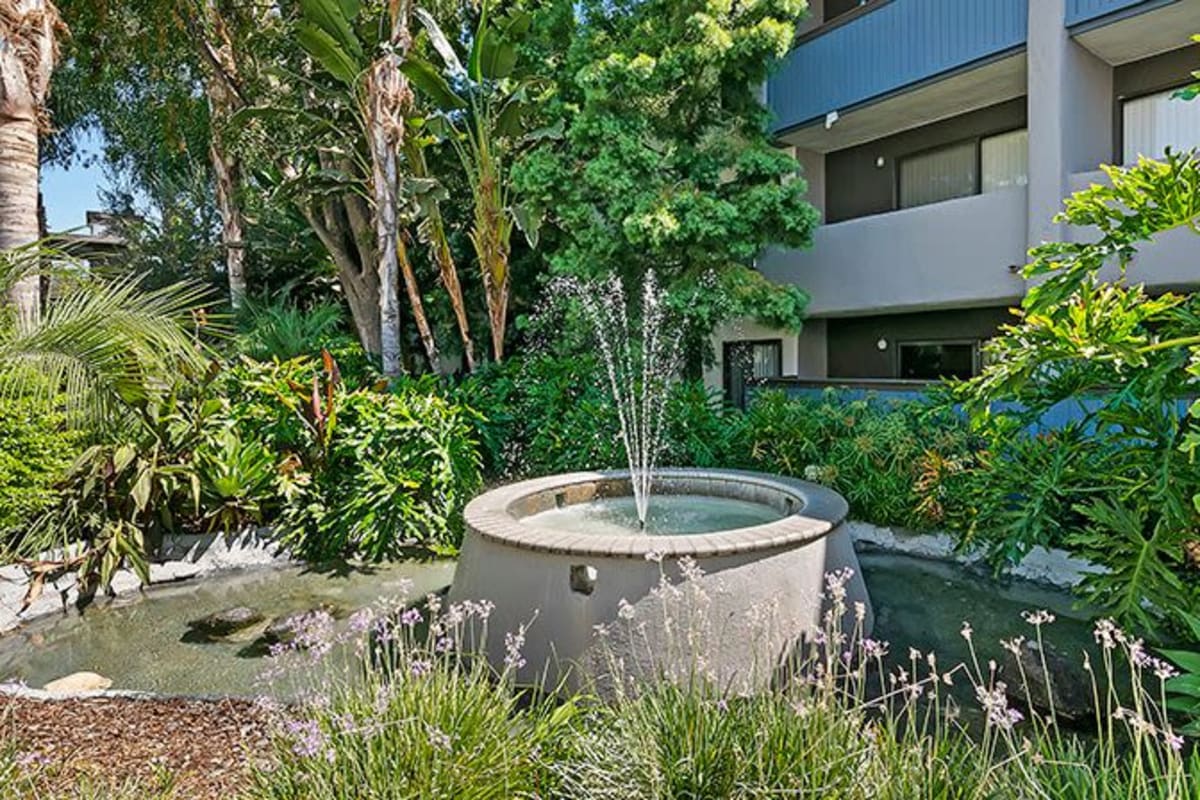 Water fountain and lush landscaping at Alura, Woodland Hills, California 