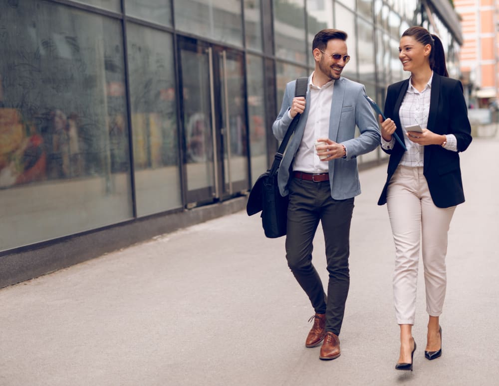 Resident discussing a project with a colleague outside their office near Sofi Sunnyvale in Sunnyvale, California