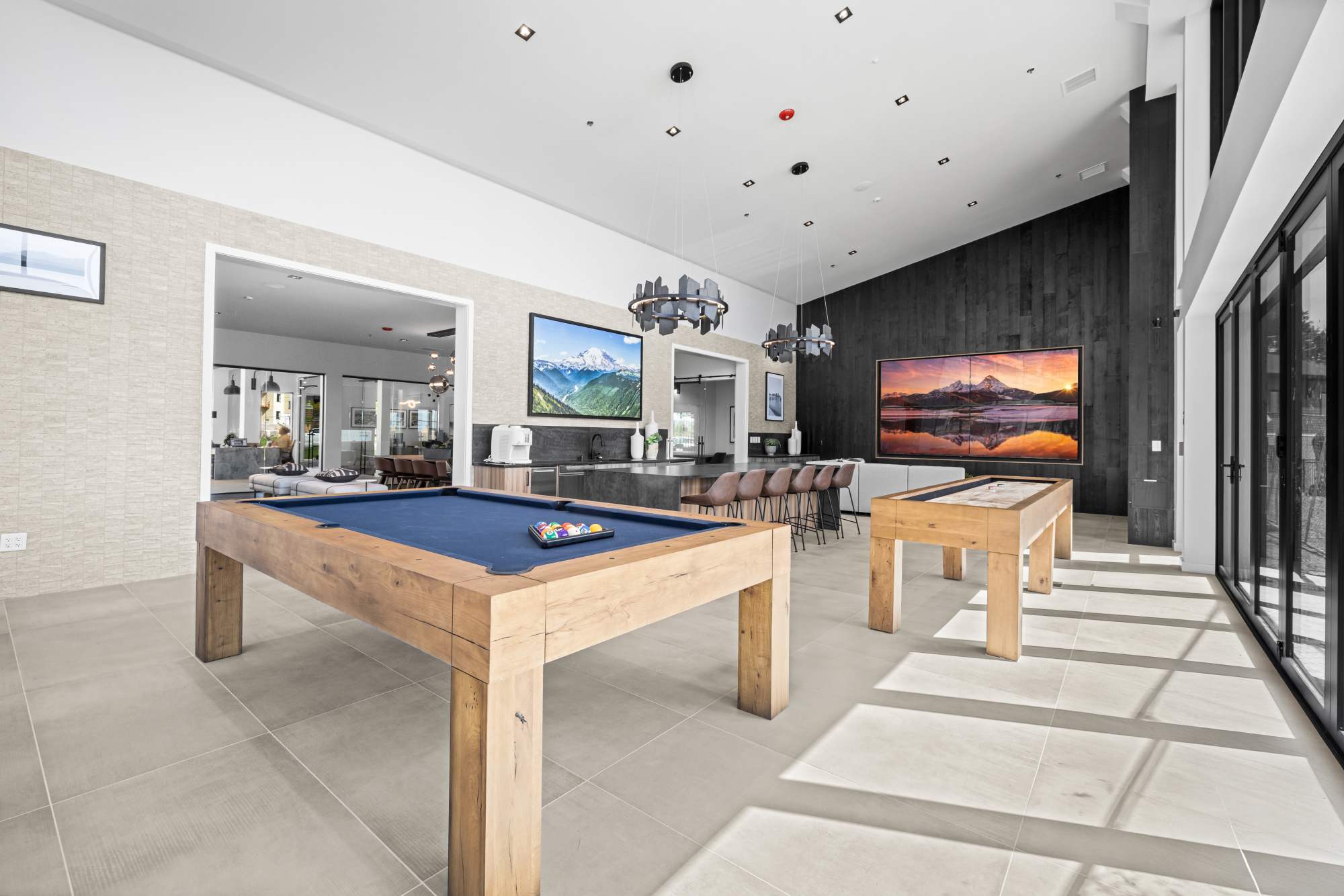Recreation room with pool table, and shuffle board at The Highlands at Silverdale in Silverdale, Washington