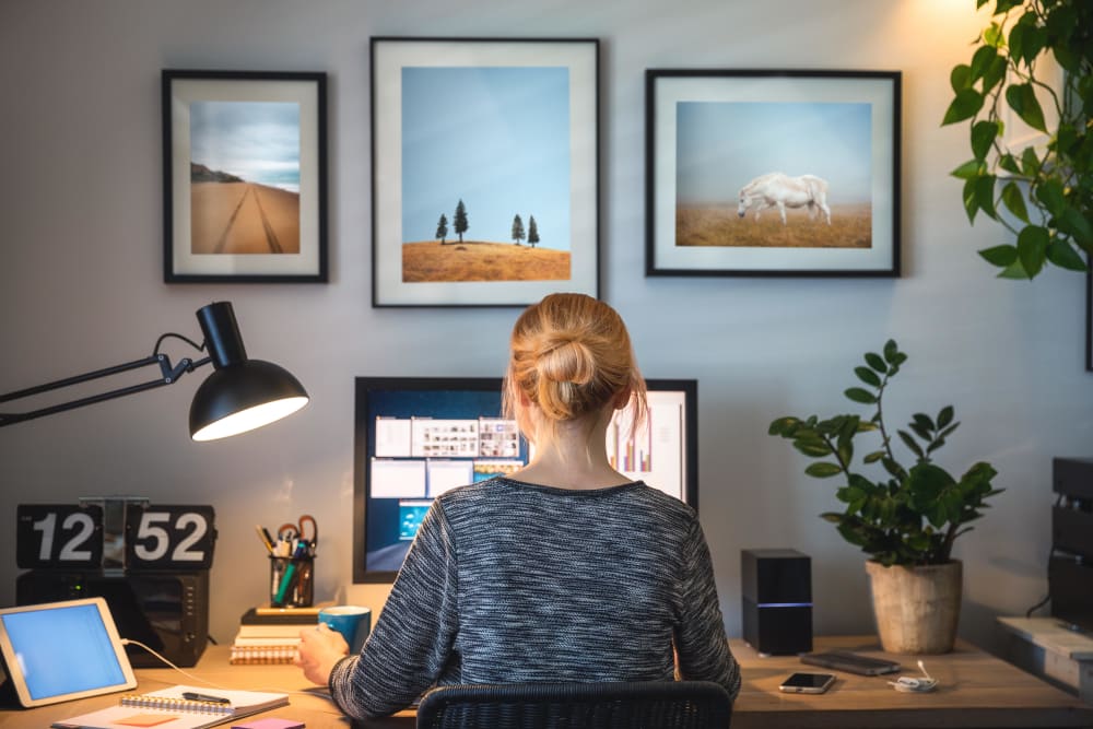 Resident working on their computer at The 805W Lofts in Richmond, Virginia