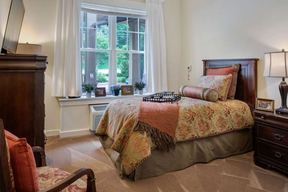 Bedroom with a large bed at Glenncrest at Webb Gin in Lawrenceville, Georgia