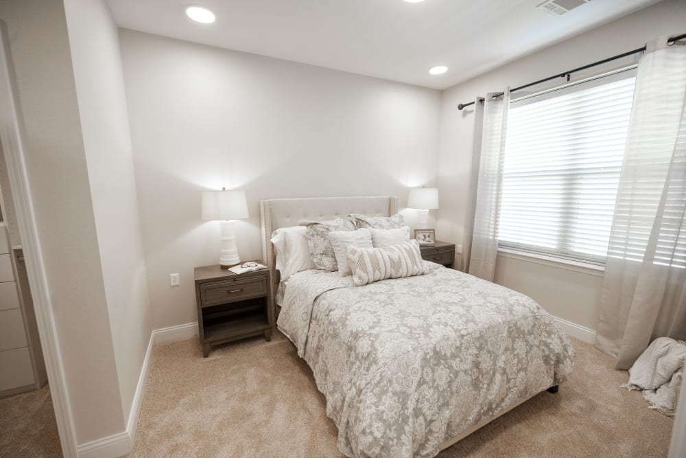Spacious bedroom room at The Madison Senior Living in Kansas City, Missouri