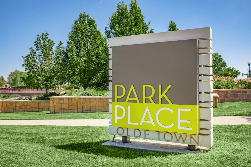 Property signage board at Park Place Olde Town Apartments in Arvada, Colorado