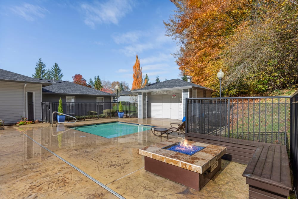 Beautiful resort-style spa and fire pit area at Pebble Cove Apartments in Renton, Washington