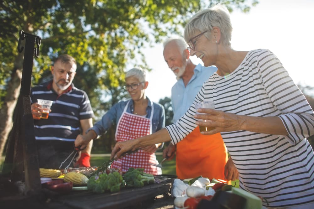 Residents barbecuing at Carriage House Apartments in Vancouver, Washington