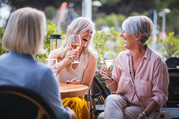 Women enjoying their independence in their new home at LARC at Burien in Burien, Washington