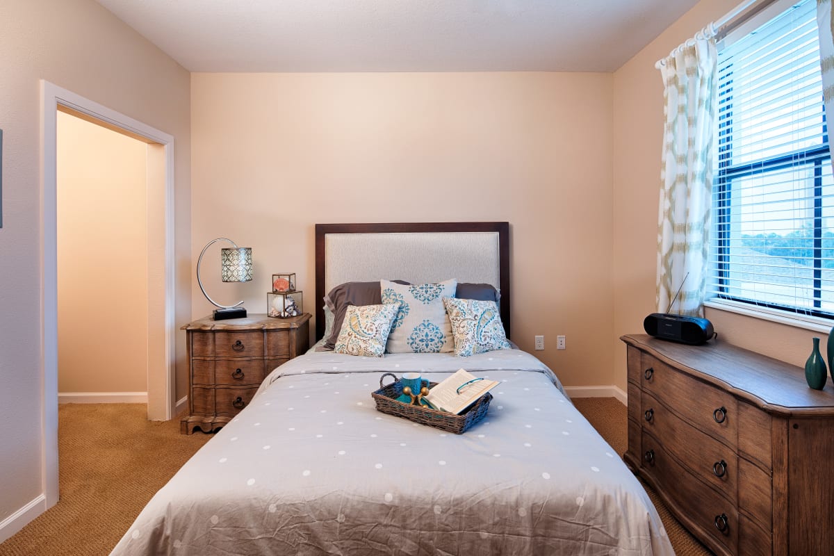 A spacious resident bedroom at The Fountains of Hope in Sarasota, Florida.