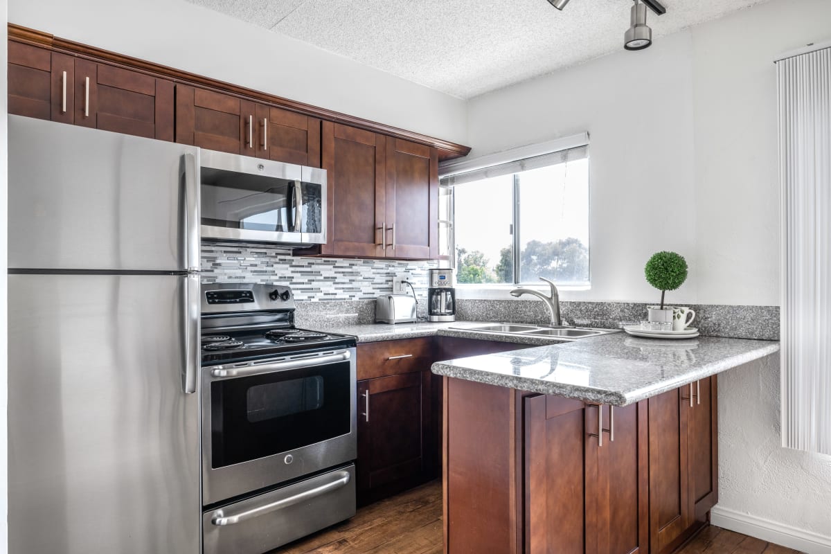 Kitchen with stainless-steel appliances at Playa Pacifica, Playa Del Rey, California