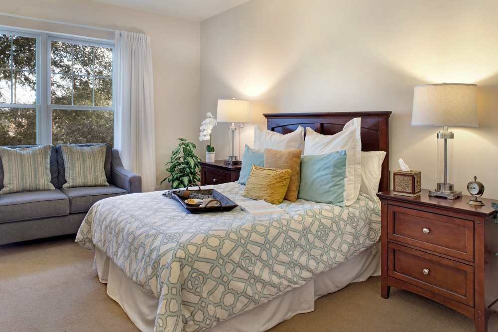 Senior living apartment bedroom at Glenncrest at Siegen in Baton Rouge, Louisiana