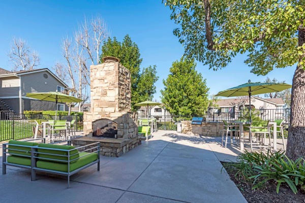 Outdoor lounge and fire-pit area at Village Oaks in Chino Hills, CA