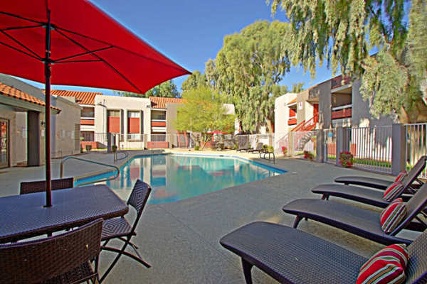 Beautiful community pool and lounge chairs at 544 Southern Apartments in Mesa,Arizona