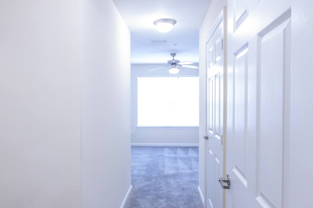 Hallway with view to bedroom at Ashton Walk in Forest Park, Georgia