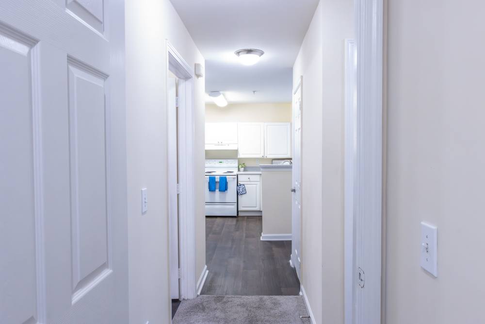 Hallway with view to kitchen at Ashton Walk in Forest Park, Georgia
