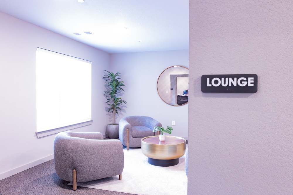Lounge area with seating at Villas At Mount Zion in Stockbridge, Georgia