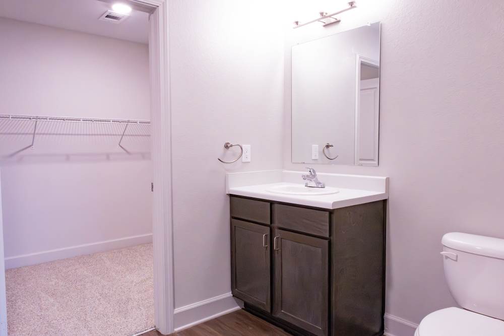 Bathroom with mirror, sink and commode at Villas At Mount Zion in Stockbridge, Georgia
