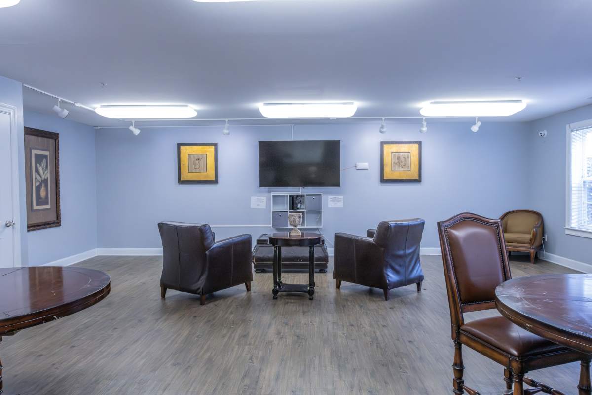 Residents in a clubhouse at Ashton Walk in Forest Park, Georgia