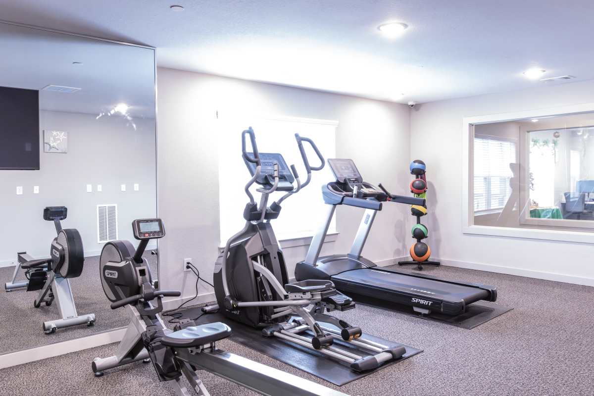 Fully equipped fitness center at Villas At Mount Zion in Stockbridge, Georgia