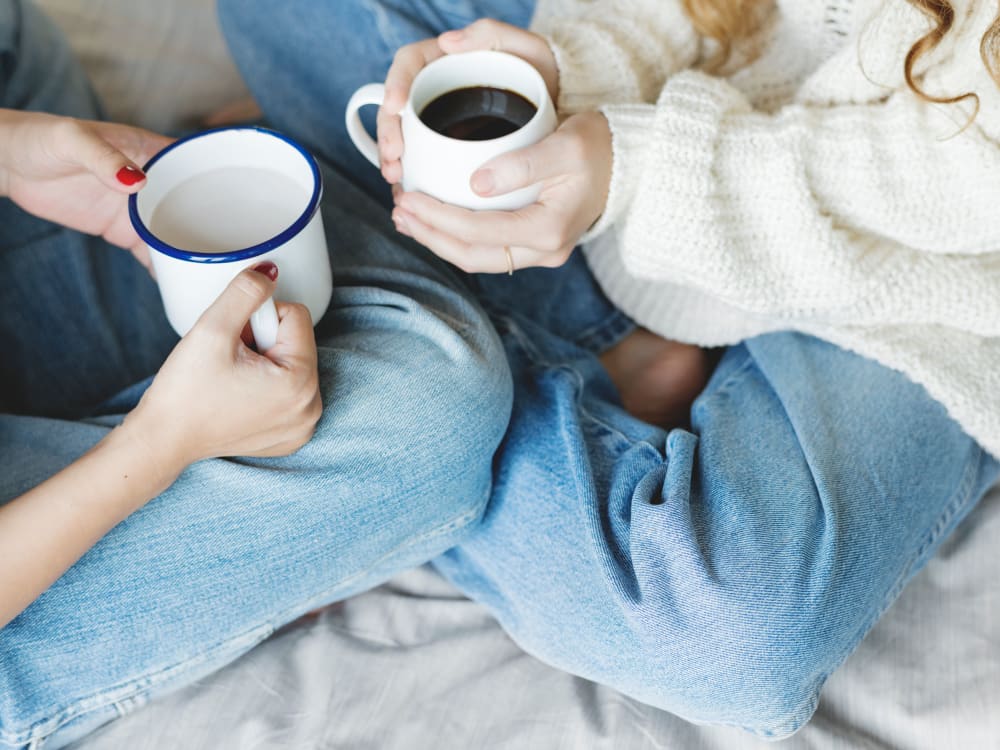 Residents enjoying their morning coffee together in their new home at Harbor Point Apartments in Mill Valley, California