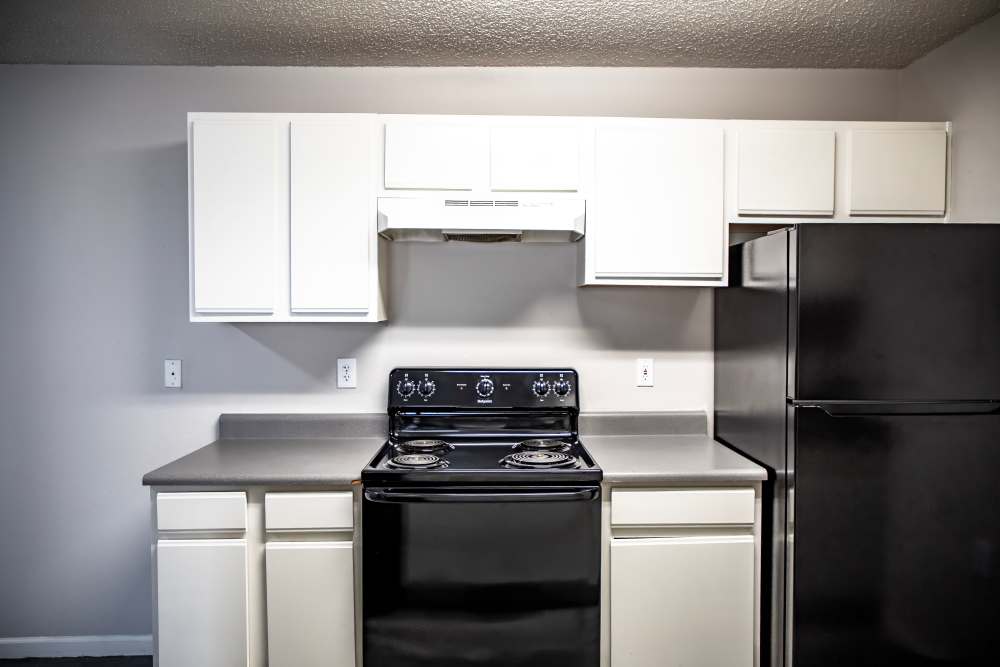 Apartment kitchen at Whispering Plains Apartments in Guymon, Oklahoma