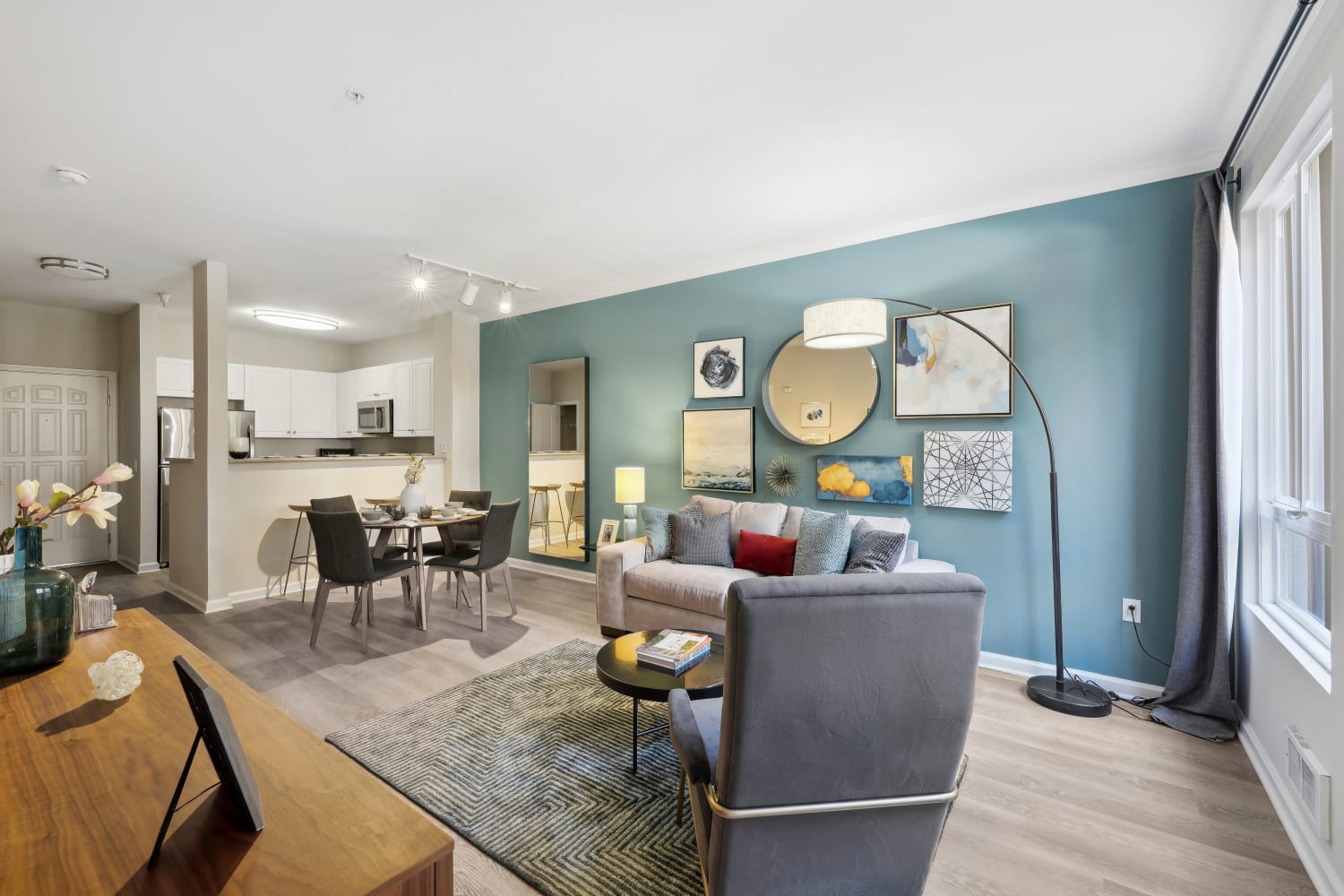 Modern living room with hardwood floors at Villa Del Sol in Sunnyvale, California