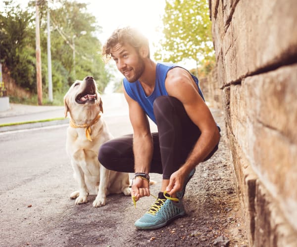 Resident heading out on a run with his dog near Cobblestone Crossings in Terre Haute, Indiana