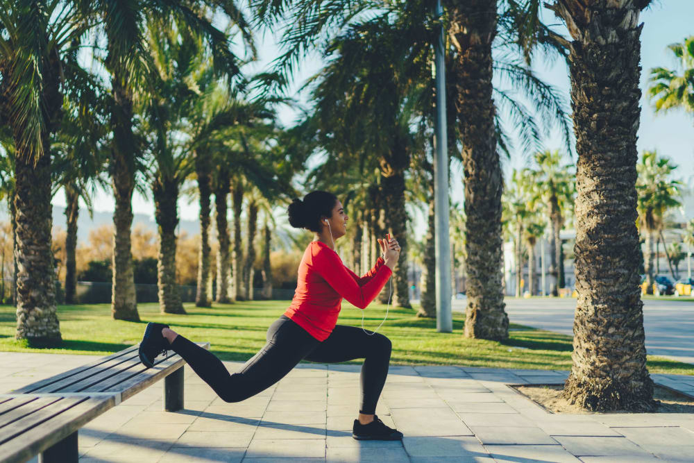 Resident exercising in a beautiful park near Villas Del Lago in Los Angeles, California